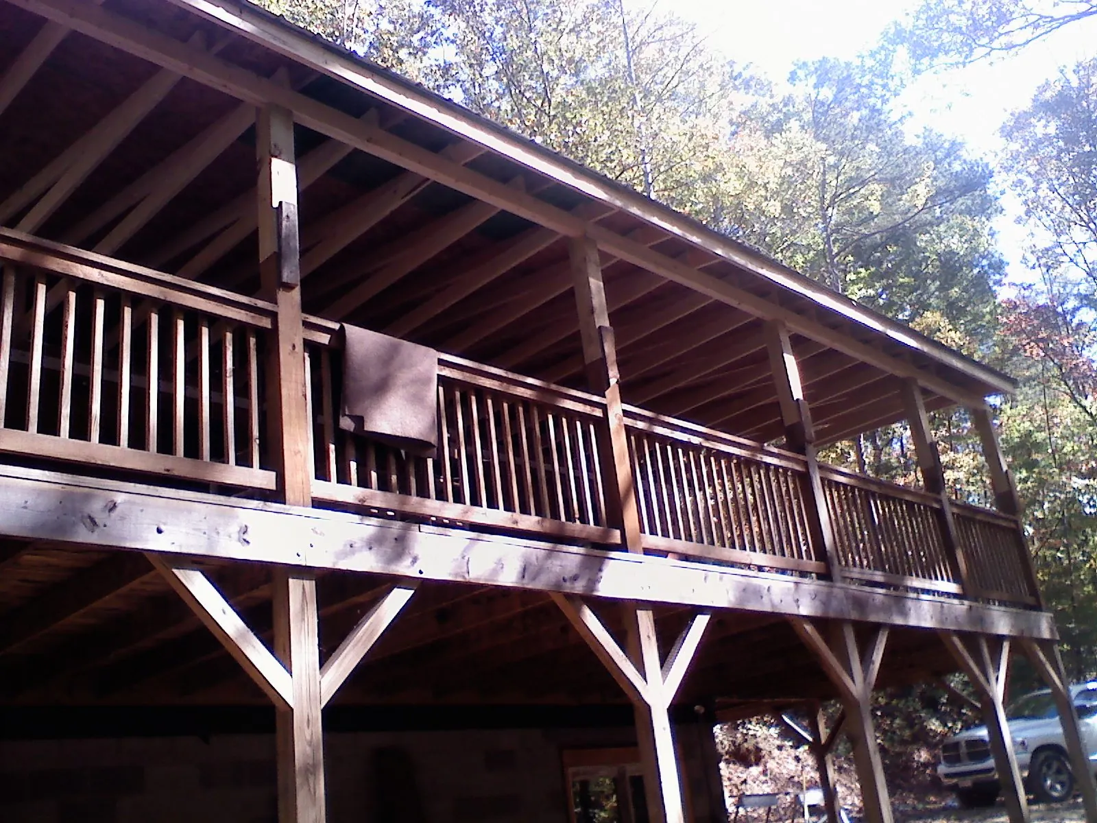 Timber framing under a new elevated porch and deck — Roof Leak Repair in Rio by Roofing Brothers